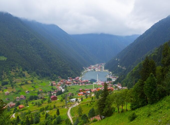 Uzungöl lake surrounded by green mountains in Trabzon.