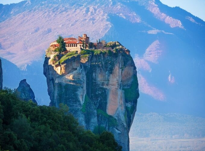 Perched atop towering rock pillars, Meteora’s monasteries create a breathtaking blend of ancient spirituality and dramatic natural scenery.