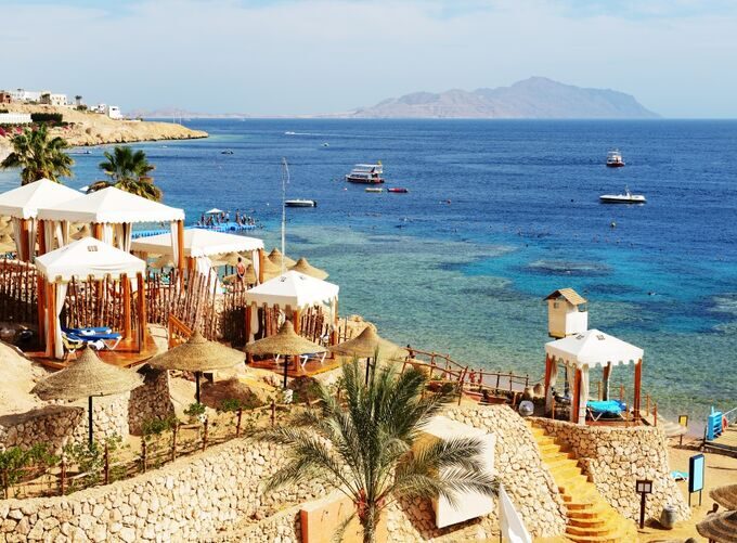 Sharm El Sheikh beach offers calm waters, sandy shores, and a relaxing holiday atmosphere ideal for families and leisure travel.