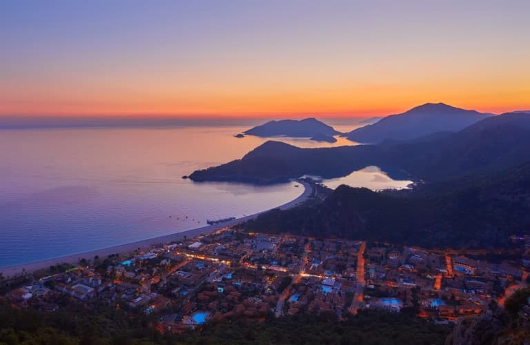 Beautiful view of Dalaman featuring sandy beaches, crystal-clear sea, green landscapes, and peaceful coastal scenery in Türkiye.