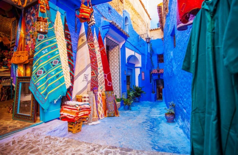 Beautiful view of Rabat featuring colorful narrow streets, local shops, traditional markets, and a lively tourism atmosphere in Morocco.