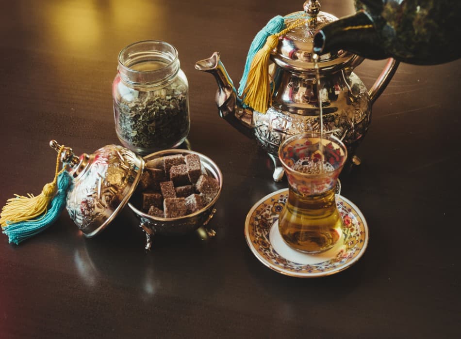 Traditional Moroccan mint tea served fresh and refreshing in decorative glasses.