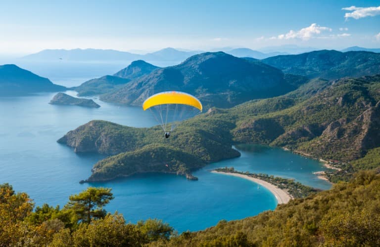 Paragliding over Fethiye offers breathtaking views of the Mediterranean coast and turquoise waters.