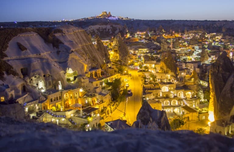 Night view of Göreme cave hotels in Cappadocia with stunning valley scenery